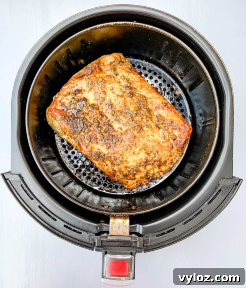 air fryer pork loin in an air fryer basket