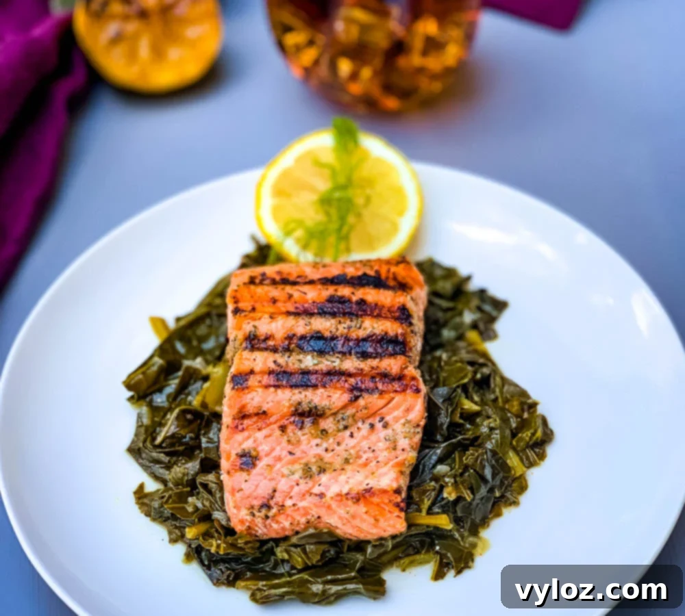 Perfectly Pan-Seared Salmon 11 pan seared cast iron salmon on a white plate with greens