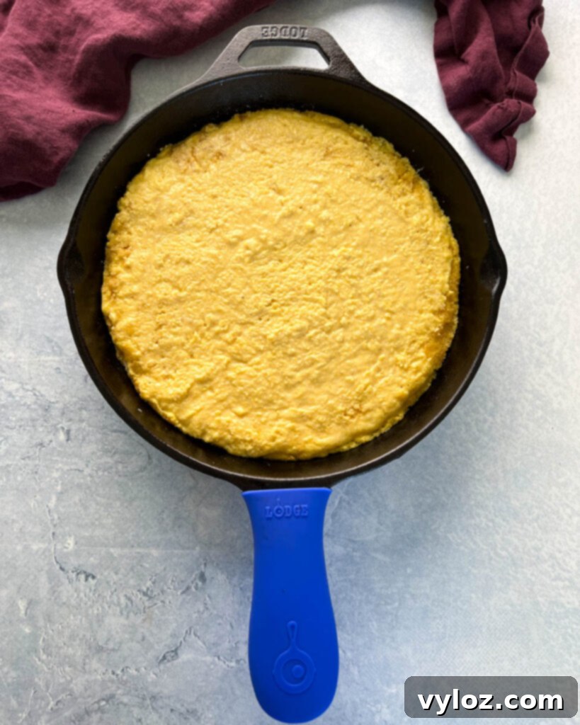 Southern unbaked cornbread in a cast iron skillet