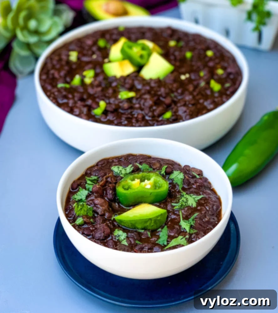Simple & Savory Instant Pot Black Bean Soup 7 instant pot black bean soup in a white bowl