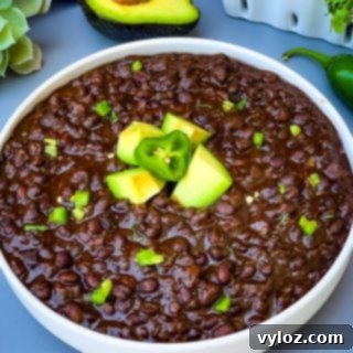 Simple & Savory Instant Pot Black Bean Soup 10 instant pot black bean soup in a white bowl