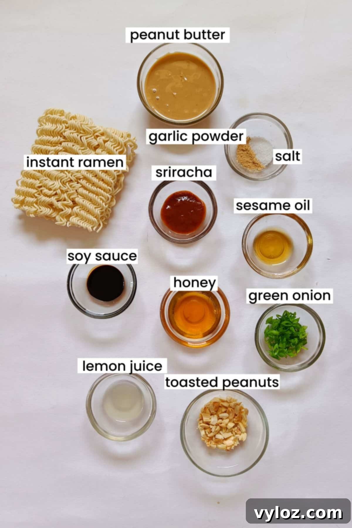 Image showing peanut butter noodles ingredients placed on a white background.