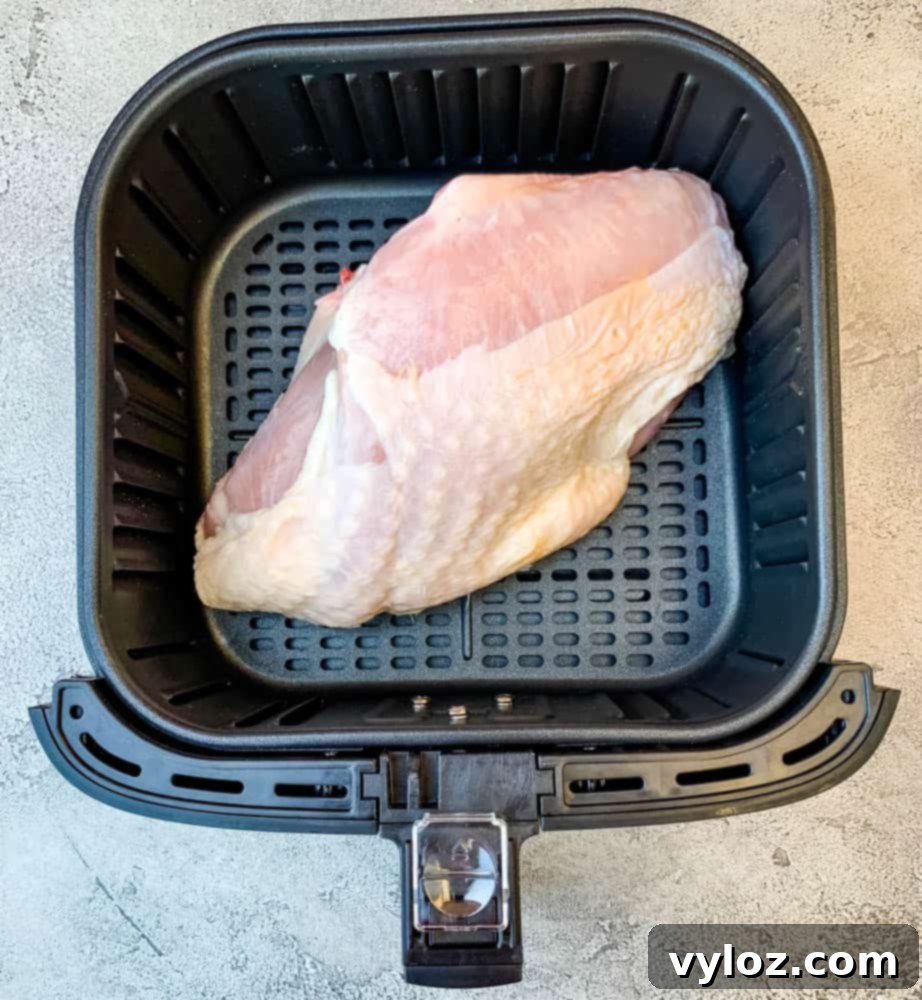 raw turkey breast in an air fryer