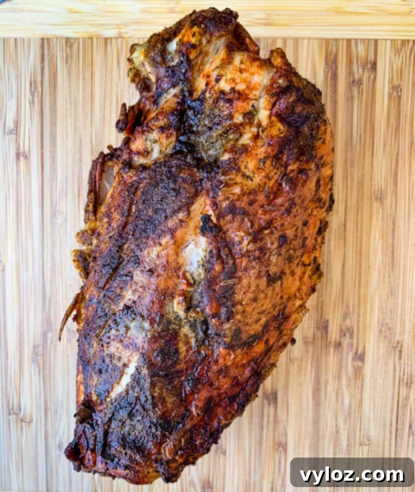 air fryer roasted turkey breast on a cutting board