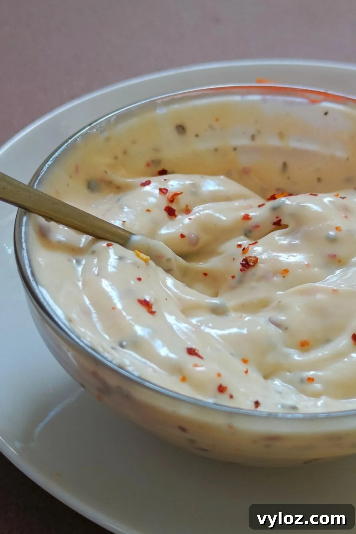 Copycat Buffalo Wild Wings Garlic Parmesan Sauce Recipe 5 Buffalo wild wings copycat garlic parmesan sauce closeup image.