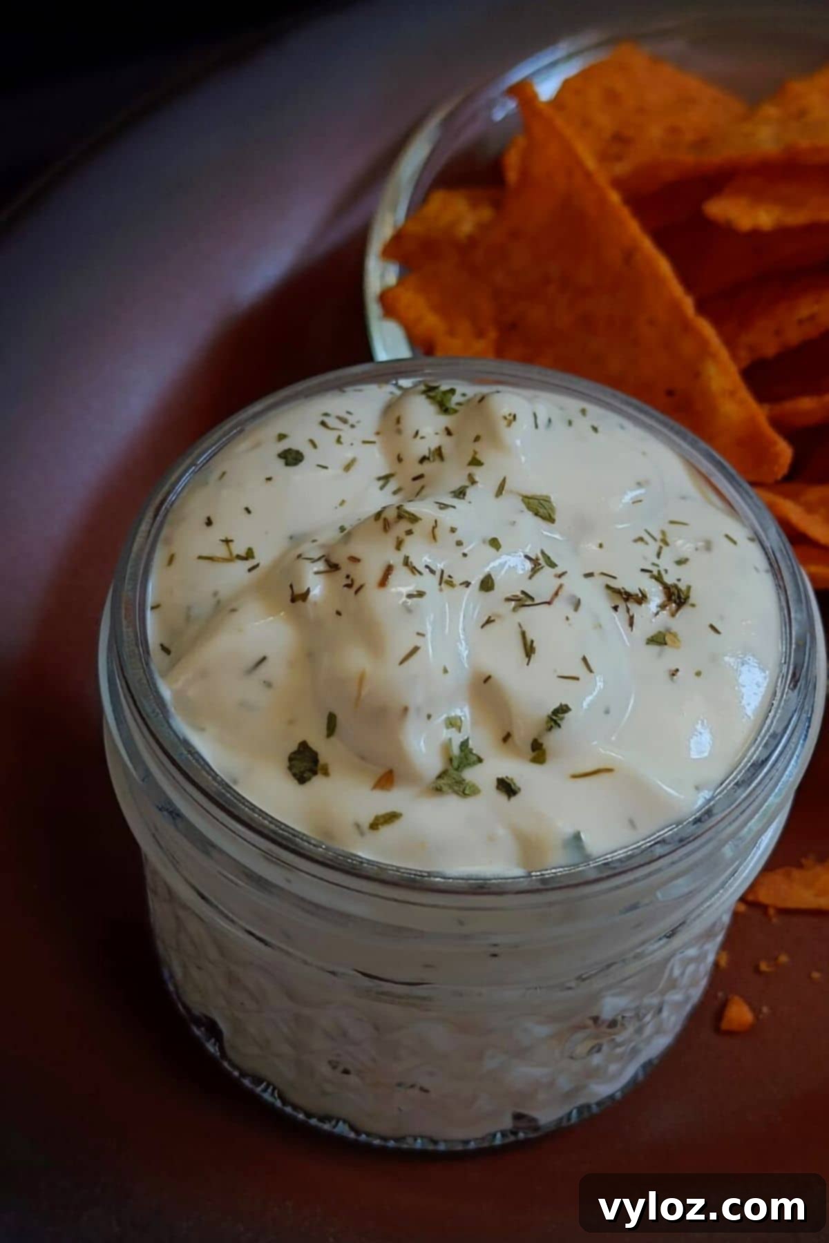 The Ultimate Homemade Wingstop Ranch 2 Image showing ranch sauce in a mason jar, highlighting its creamy texture and fresh appeal.