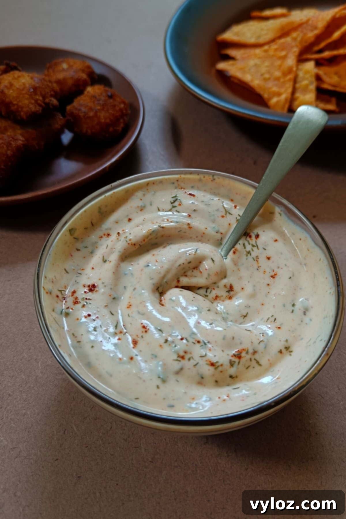 Image showing blackened ranch sauce served with snacks.