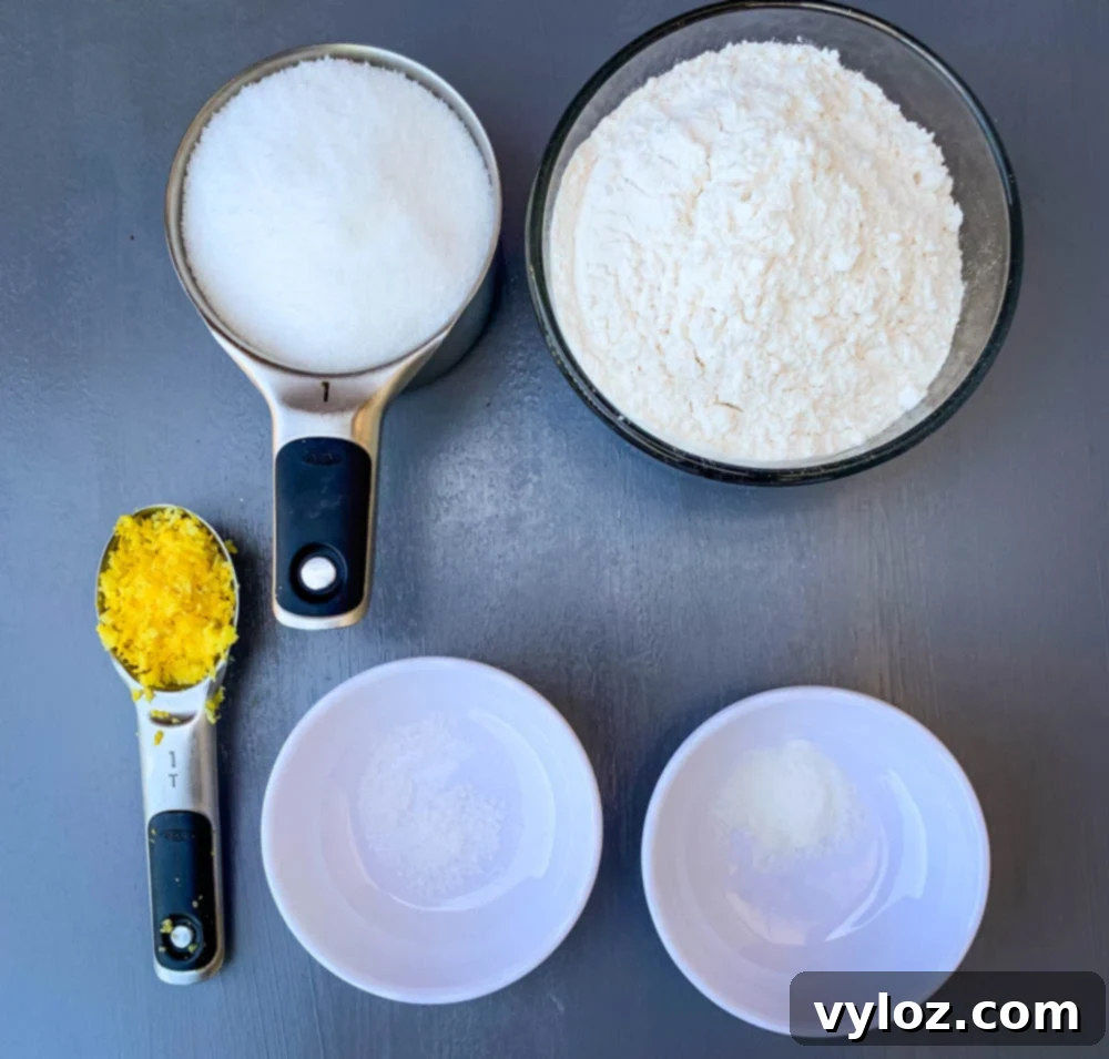 sugar, lemon zest, and flour in bowls for air fryer cake