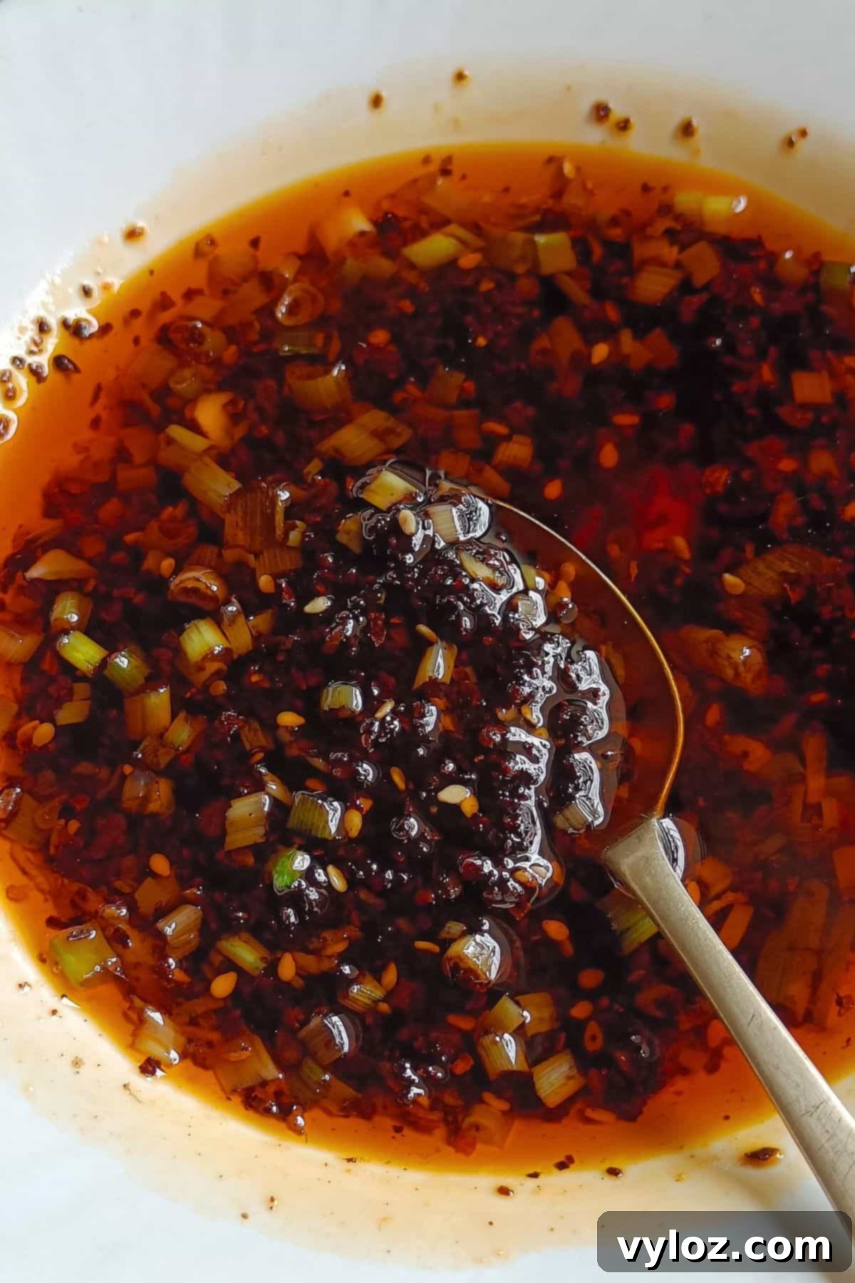 The Ultimate Wet Sauce 5 Image showing the finished wet wet sauce in a pristine white bowl, showcasing its vibrant red color and rich texture.
