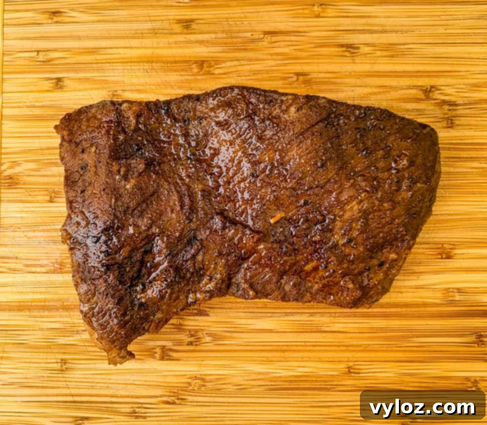 Tender Instant Pot Brisket 6 Instant Pot Brisket on a cutting board