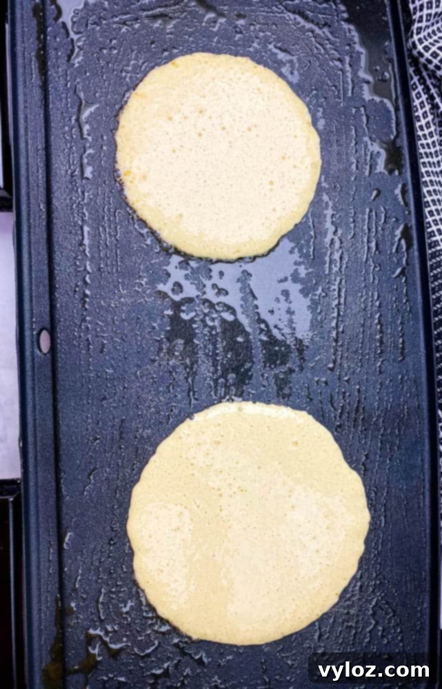 keto low carb pancake mix batter on a griddle