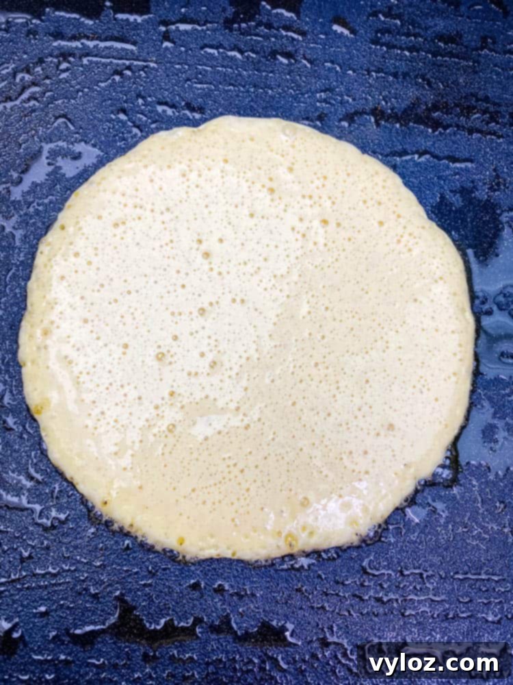 keto low carb pancake mix batter on a griddle
