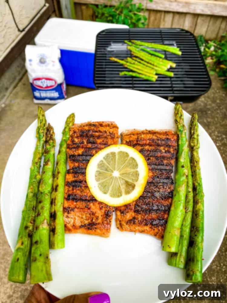 keto bbq grilled salmon and asparagus on a white plate