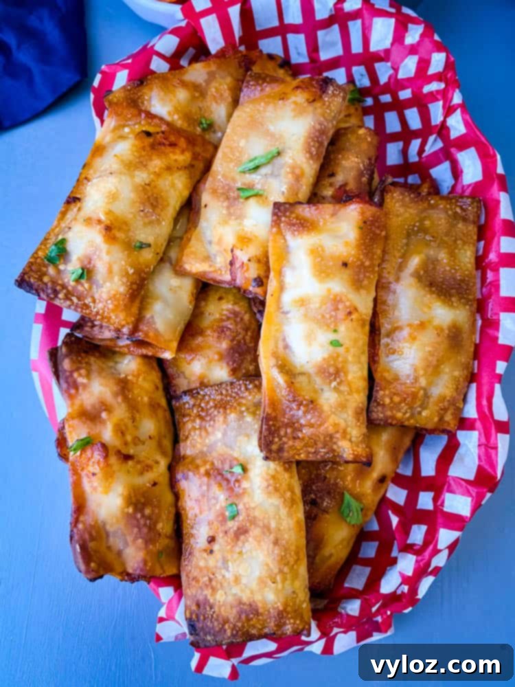 air fryer pizza rolls in a black bowl