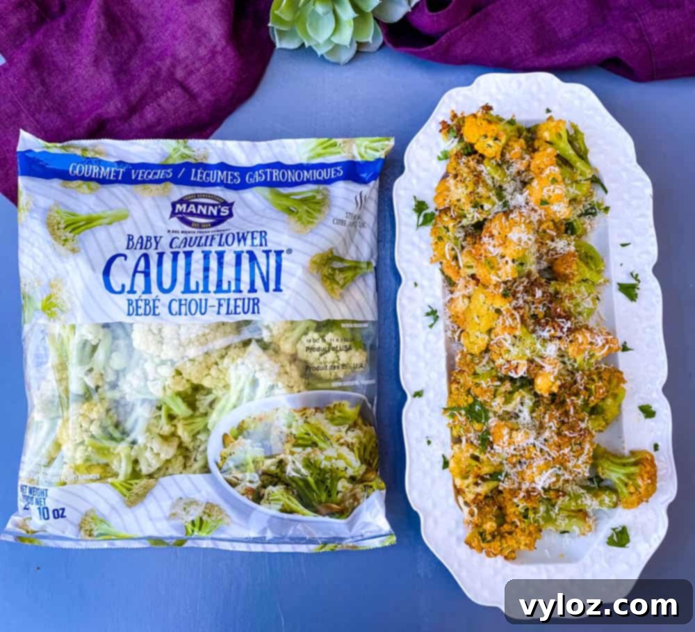 air fryer caulilini on a white plate, ready to be served