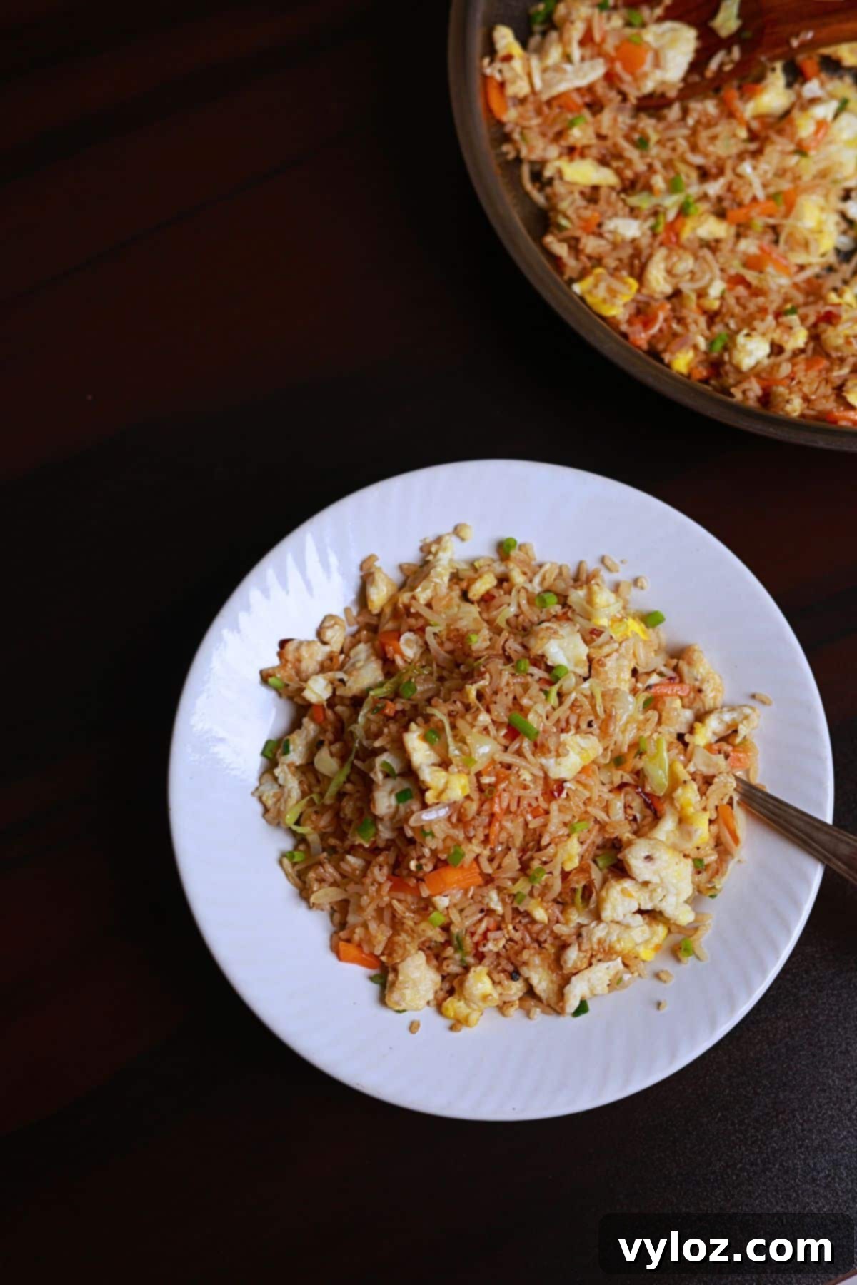 Image showing fried rice served on a white plate.