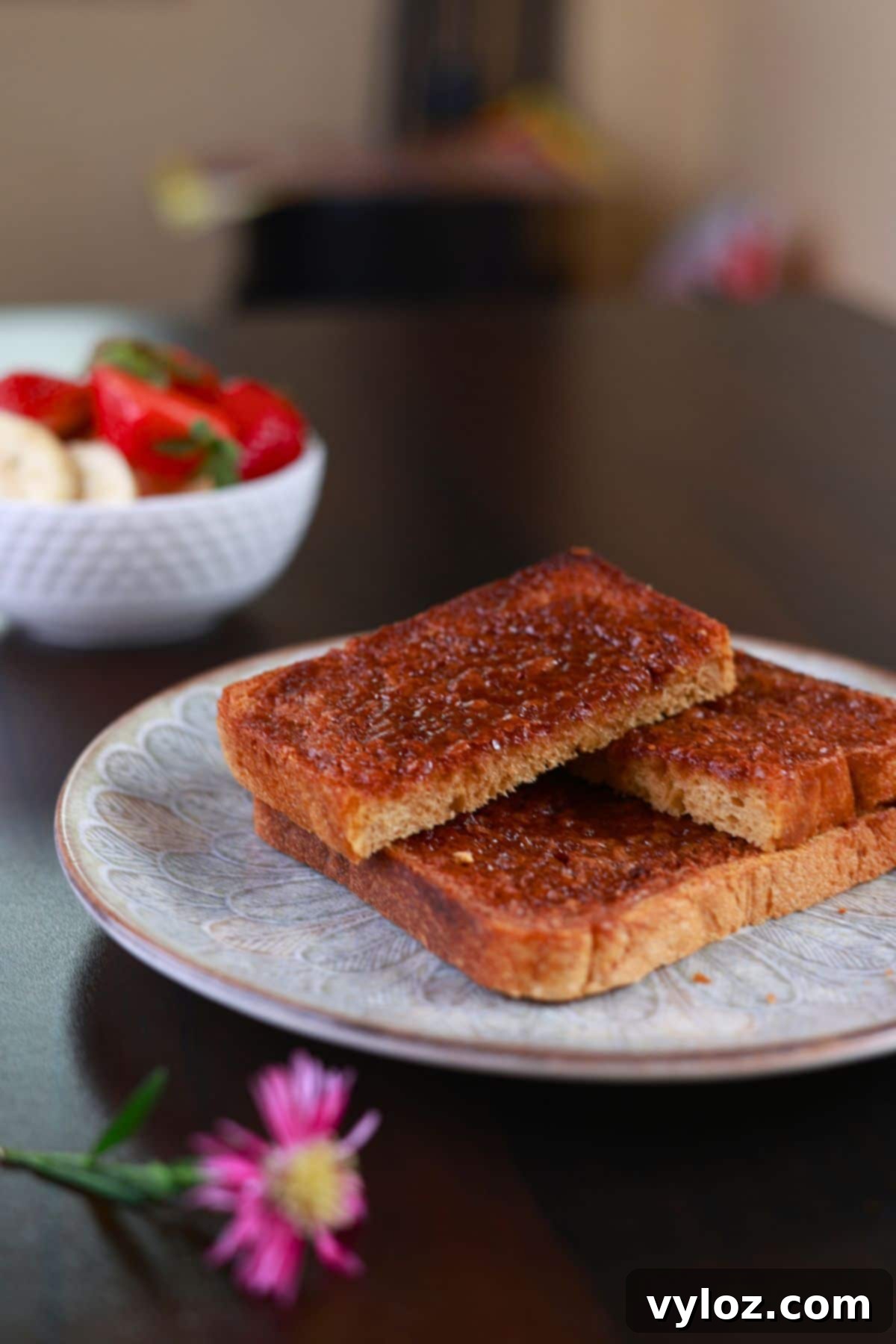 Golden Air Fryer Cinnamon Toast 2 Crispy cinnamon sugar toast served on a plate.
