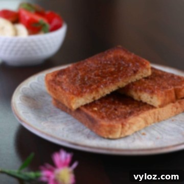 Golden Air Fryer Cinnamon Toast 6 Air fried cinnamon toast served on a plate.