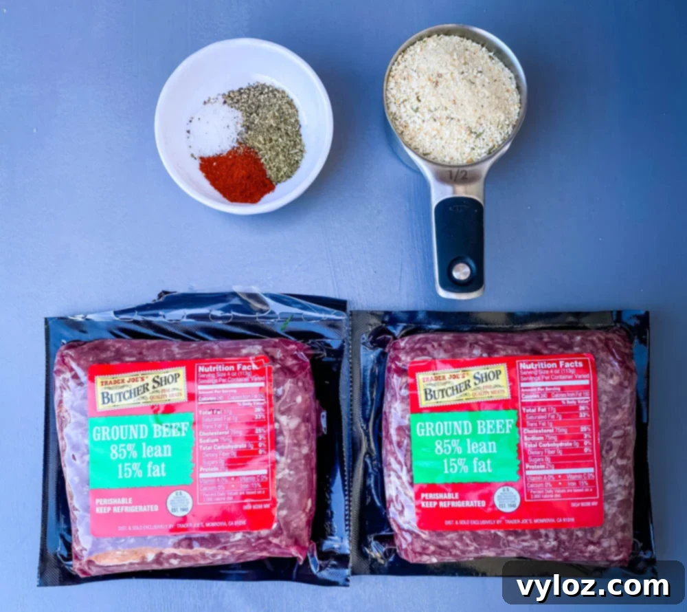 Various ingredients for air fryer meatloaf including ground beef, breadcrumbs, and spices.