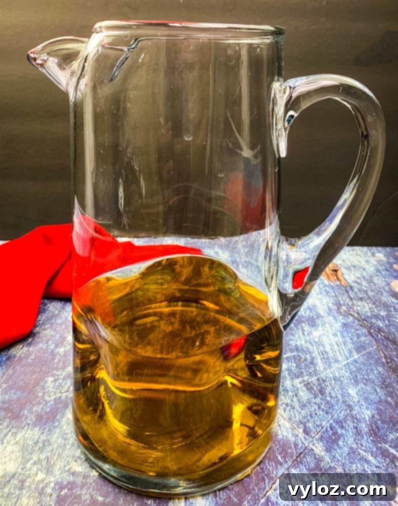 dark rum in a pitcher for Bahama Mama recipe