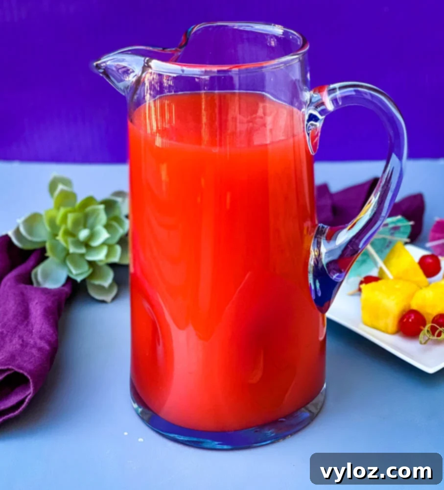 Bahama Mama drink cocktail in a glass pitcher