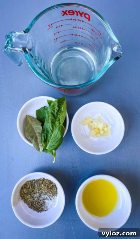 Key ingredients for a delicious keto low carb marinara sauce: fresh basil, garlic cloves, dry white wine, and olive oil.