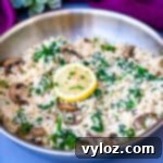 keto low carb cauliflower risotto in a pan with lemon