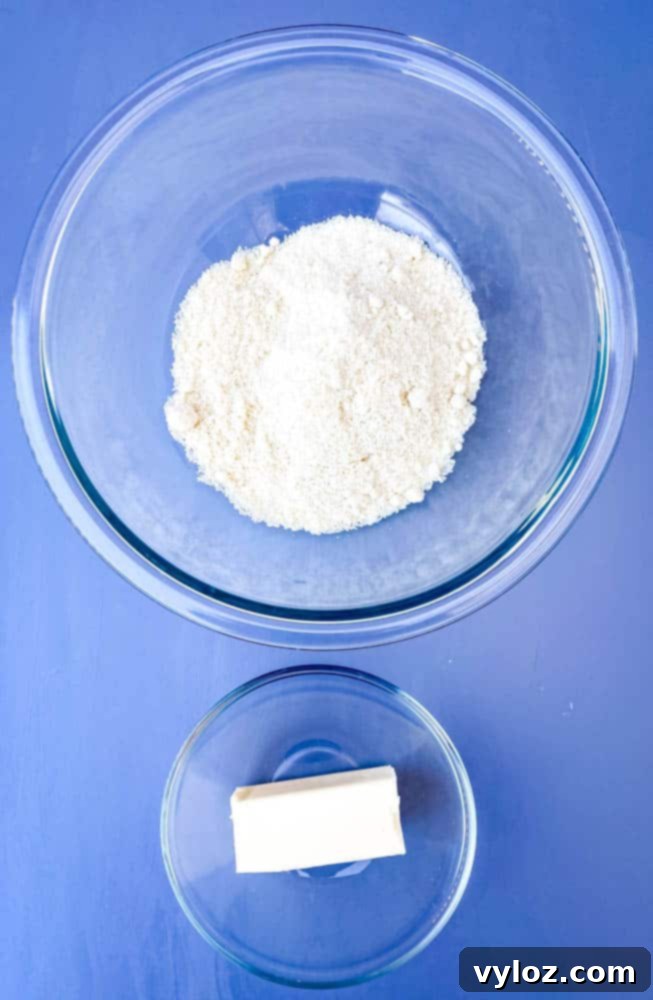 Almond flour and melted butter, foundational ingredients for sugar-free, low-carb cookie dough