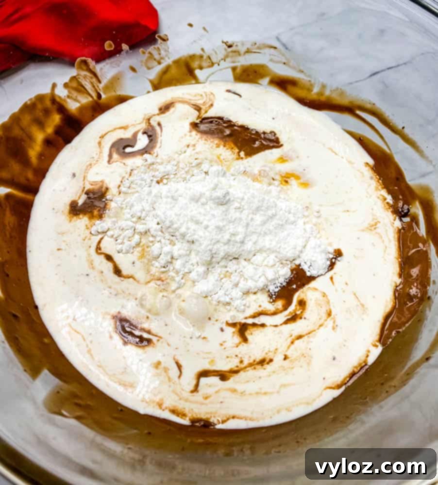 Effortless Sugar-Free Chocolate Mousse 6 Another angle of keto low carb chocolate mousse batter in a glass bowl, showcasing its texture