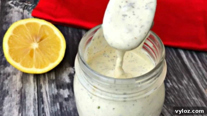 Homemade keto low-carb ranch salad dressing made with mayo, cream, garlic, herbs, and spices.