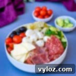 antipasto salad in a white bowl