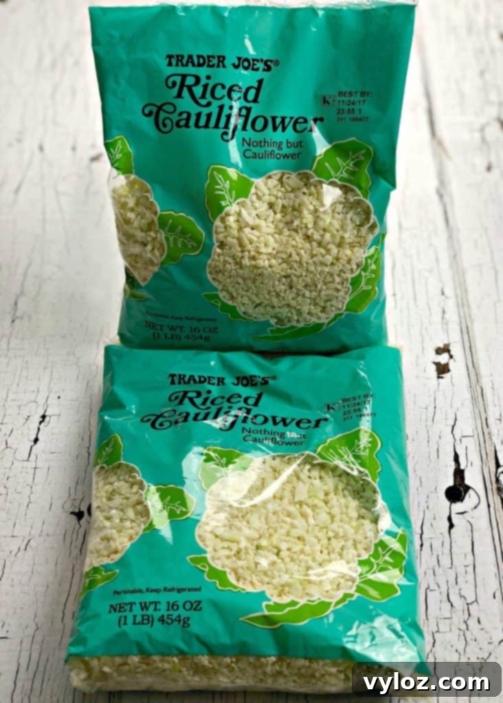 Close-up of freshly cooked Keto Low-Carb Cauliflower Vegetable Fried Rice with Chicken, showing vibrant colors and textures of the ingredients