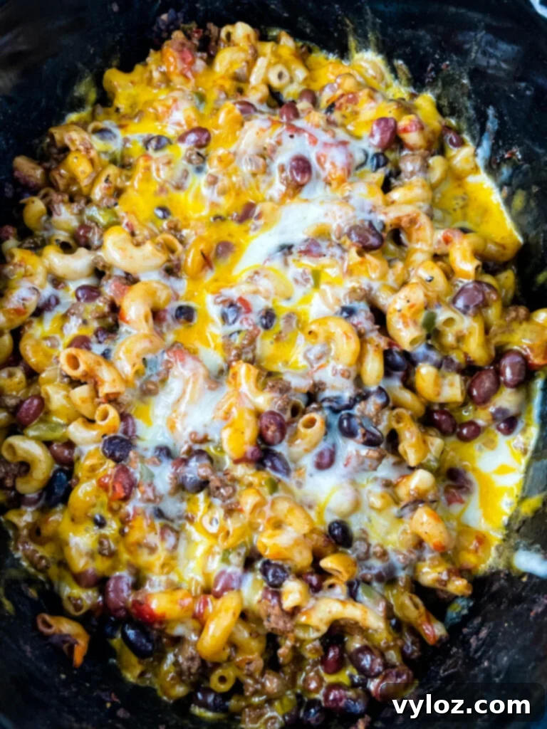 Ultimate Slow Cooker Chili Mac and Cheese 9 chili mac and cheese in a Crockpot slow cooker