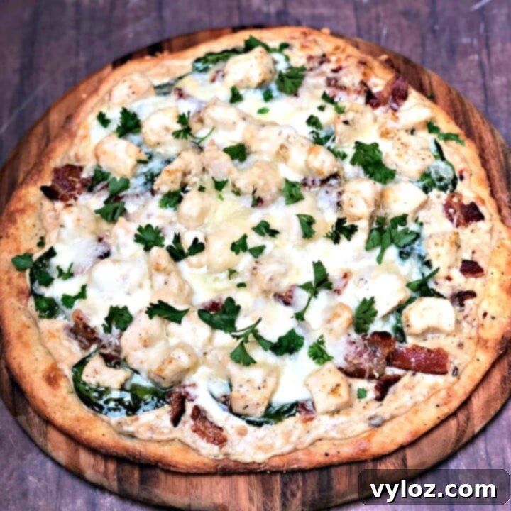 Keto Low-Carb Bacon, Chicken, Spinach Alfredo Pizza with a Fathead crust