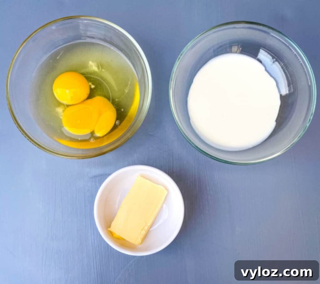 Southern Keto Chicken Fried Steak and Gravy 4 raw eggs, heavy cream, and butter in separate bowls