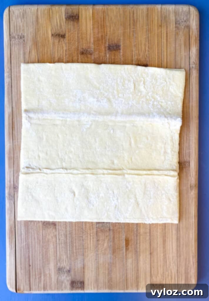 puff pastry on a bamboo cutting board