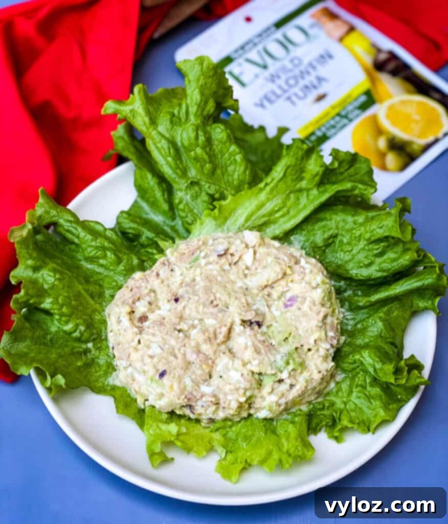 avocado tuna on a white plate with romaine lettuce