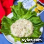 avocado tuna on a white plate with romaine lettuce