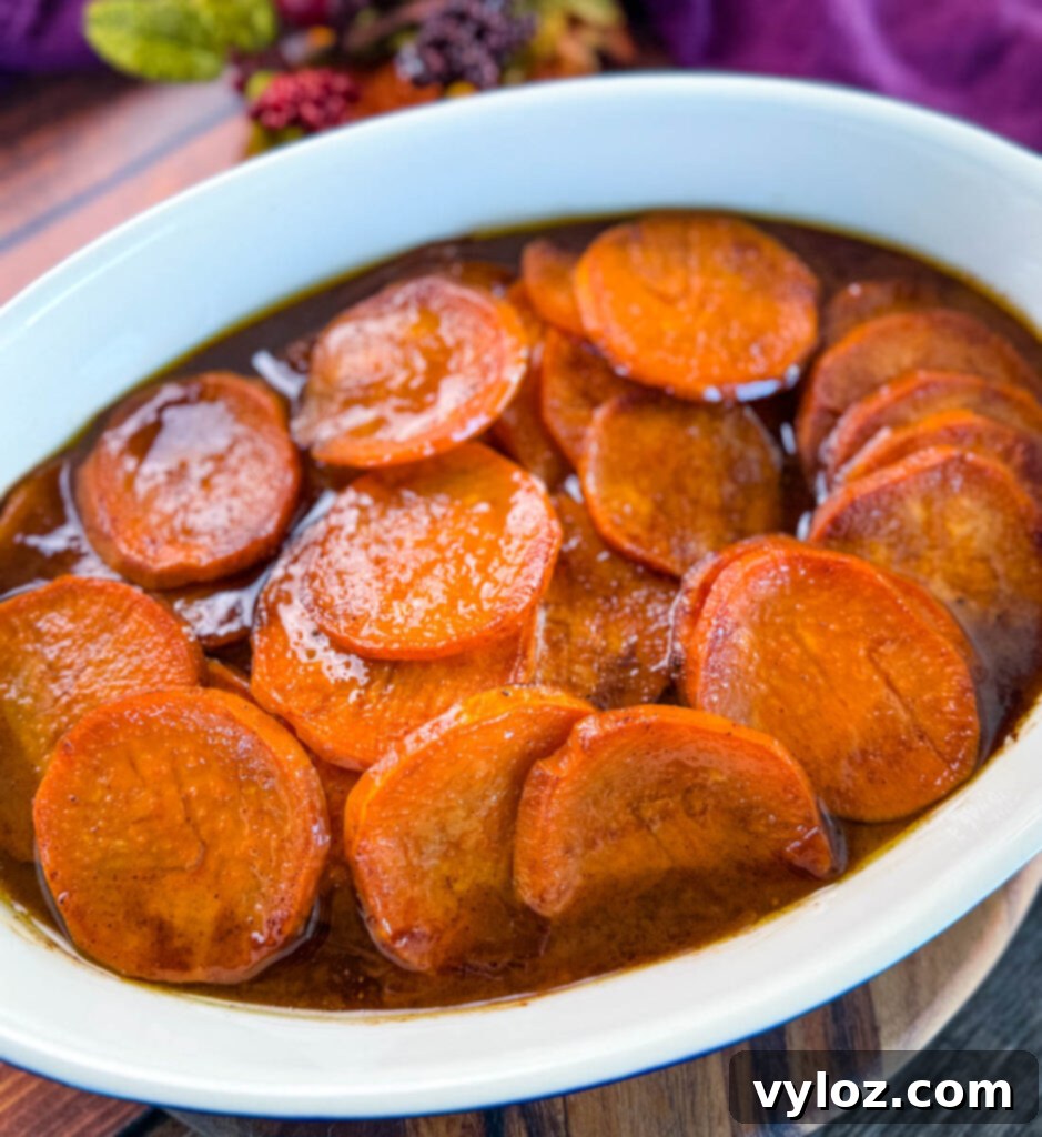 Mama's Easy Candied Sweet Potatoes 8 Southern soul food candied sweet potatoes in a baking dish