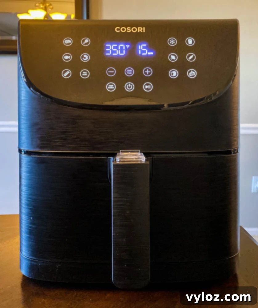 Mastering Your Air Fryer 3 Cosori 5.8 quart air fryer prominently displayed on a clean kitchen surface