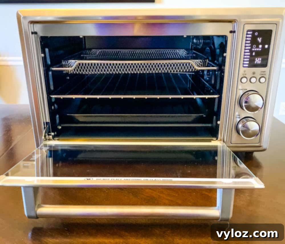Mastering Your Air Fryer 5 Cosori air fryer toaster oven on a kitchen counter, highlighting its larger size