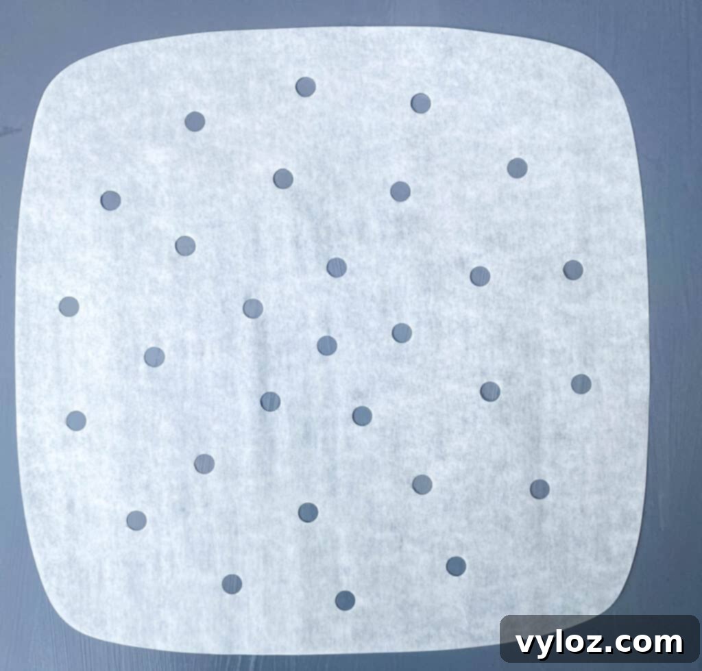 Mastering Your Air Fryer 8 Specialized air fryer parchment paper with breathable holes, laid flat