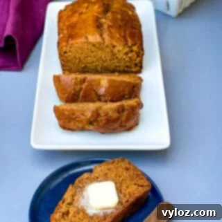 healthy banana bread sliced on a white plate