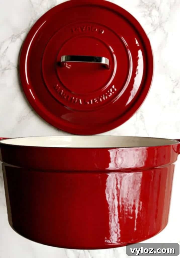 Rich and creamy Dutch Oven Mashed Potatoes with Bacon, topped with fresh green onions