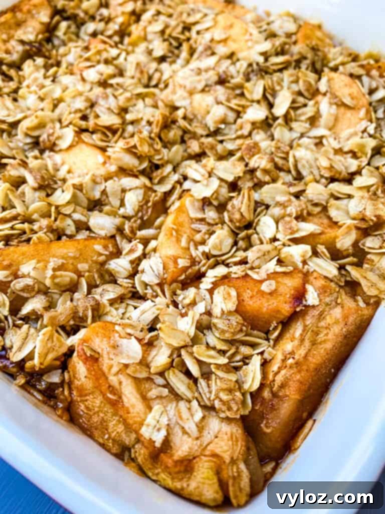 healthy apple crisp in a red baking dish