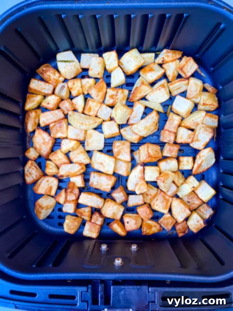 Crispy Air Fryer Roasted Potatoes 6 cooked roasted potatoes in an air fryer