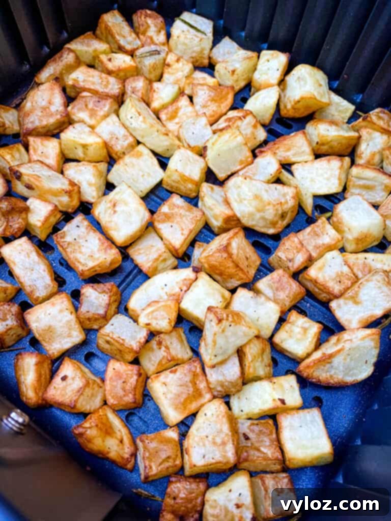 Crispy Air Fryer Roasted Potatoes 7 cooked roasted potatoes in an air fryer