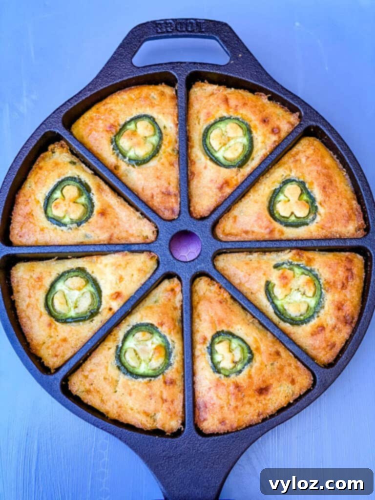 Zesty Cheddar Jalapeño Cornbread 9 jalapeno cheddar cornbread in a cast iron wedge pan