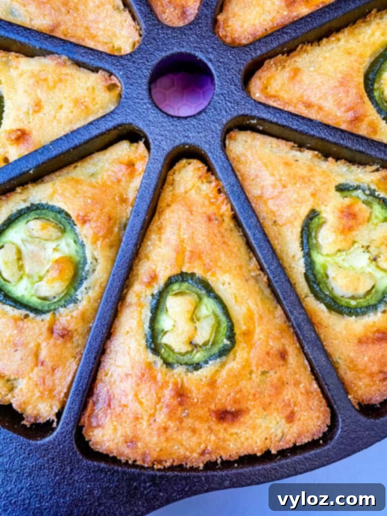 Zesty Cheddar Jalapeño Cornbread 10 jalapeno cheddar cornbread in a cast iron wedge pan