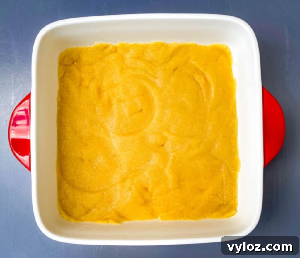 Healthy Southern peach cobbler being prepared, ready for baking